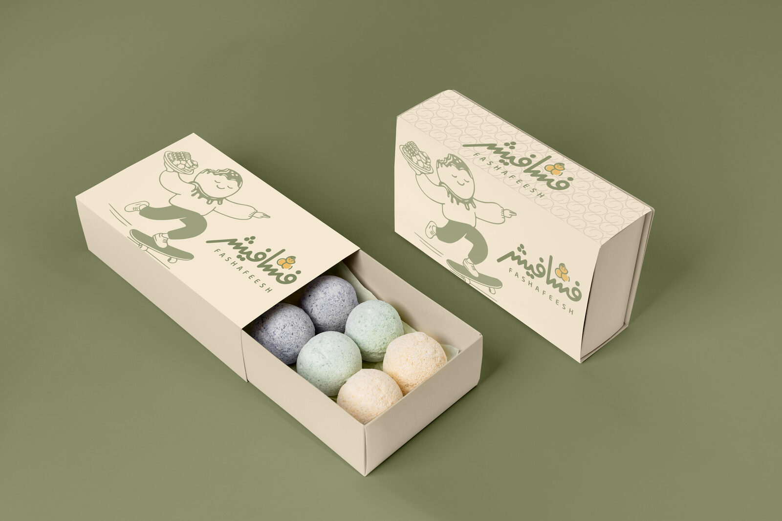 Cream slide-out drawer box featuring skater Fashfoosh illustration — filled with colored mochi-like sweets